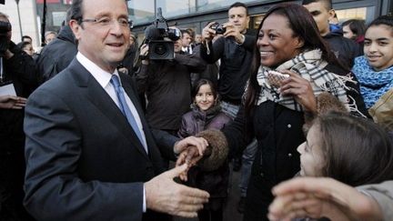 François Hollande, en visite à Evry (Essonne), le 22 février 2012. (AFP - Patrick Kovarik)