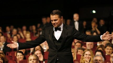 Première star à fouler le tapis rouge de cette 66e édition, il est à l'affiche de "Gatsby le Magnifique"
 (Valérie Hache/AFP)