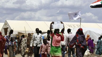 Réfugiés du Soudan du Sud dans un camp de réfugiés au Soudan, au sud de Karthoum. Plus de 95.000 Soudanais du Sud sont entrés au Soudan, a déclaré l'ONU, alors que des milliers de personnes continuent à fuir la guerre et la famine dans la plus jeune nation du monde. (ASHRAF SHAZLY / AFP)