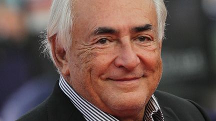 L'ex-directeur du Fonds mon&eacute;taire international, Dominique Strauss-Kahn, au festival du film am&eacute;ricain &agrave; Deauville (Calvados), le 13 septembre 2014. (CHARLY TRIBALLEAU / AFP)