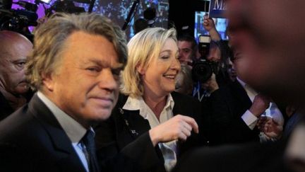Marine Le Pen et Gilbert Collard fêtent le score du FN à la présidentielle à Paris, le 22 avril 2012. (AFP - Joël Saget)