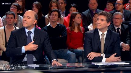 Les ministres de l'Economie et du Redressement productif, Pierre Moscovici et Arnaud Montebourg, le 28 novembre 2013. (FRANCE 2)