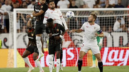 Players from Lens and Sevilla compete for the ball during the first day of the group stage of the 2023-2024 Champions League.  (MAXPPP)