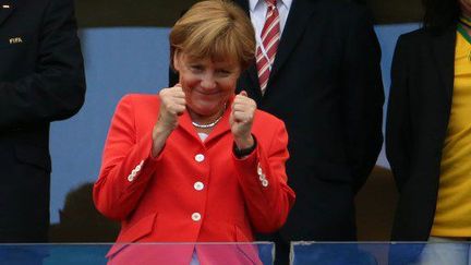 Enthousiaste et victorieuse, Angela Merkel a fait le déplacement au Brésil pour soutenir l'équipe d'Allemagne. Un bon choix puisqu'elle a pu assister au premier match de la Mannschaft, triomphal, contre le Portugal. (WILLIAM VOLCOV / BRAZIL PHOTO PRESS)