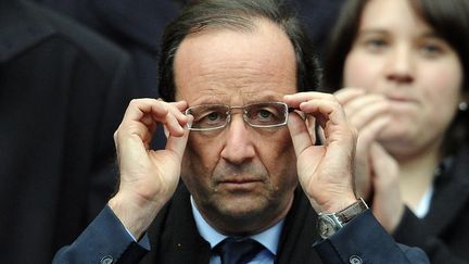 Fran&ccedil;ois Hollande dans les tribunes du stade de France le 10 mars 2012. (FRANCK FIFE / AFP)