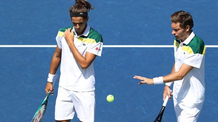 Pierre-Hugues Herbert et Nicolas Mahut à l'US Open, à New York, en septembre dernier. (ELSA / GETTY IMAGES NORTH AMERICA)