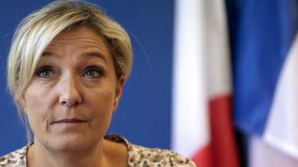 La pr&eacute;sidente du Front national, Marine Le Pen, lors d'une conf&eacute;rence de presse, le 10 juillet 2013 &agrave; Nanterre (Hauts-de-Seine).&nbsp; (KENZO TRIBOUILLARD / AFP)