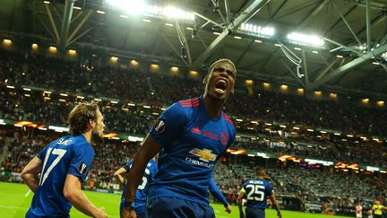 Le milieu de terrain français de Manchester United Paul Pogba célèbre son but lors de la finale de la Ligue Europa contre l'Ajax Amsterdam, le 24 mai 2017 à Stockholm. (SALIH ZEKI FAZLIOGLU / AFP)