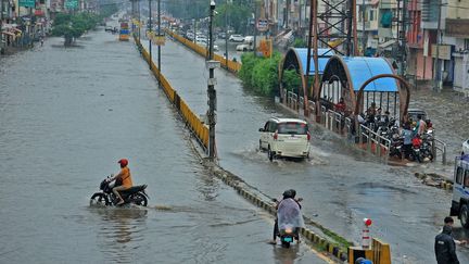 Monsoon rains on a street in the city of Jaipur, in the state of Rajasthan, India, on August 12, 2024. (VISHAL BHATNAGAR / NURPHOTO / AFP)