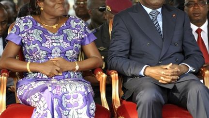 Laurent Gbagbo, président ivoirien non reconnu par la communauté internationale, et sa femme, le 4 février 2011. (AFP PHOTO/ SIA KAMBOU)