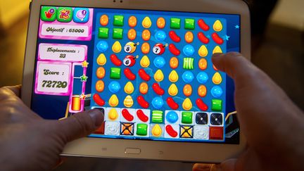 "Candy Crush" est le titre phare de l'&eacute;diteur de jeux pour mobile King. (PHILIPPE HUGUEN / AFP)