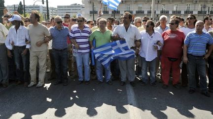 Des chauffeurs routiers grecs manifestent devant leur Parlement le 30 juillet (AFP Louisa Gouliamaki)