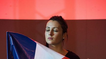 &nbsp; (Une jeune militante du Front national lors d'un meeting à Nïmes le 2 décembre. © Maxppp)