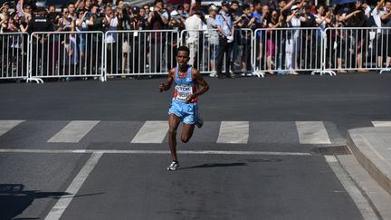 Ghebreslassie vainqueur du marathon de New York (GREG BAKER / AFP)