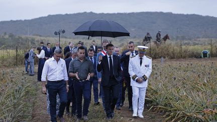 Emmanuel Macron visiting a farm in Moindou (New Caledonia), July 25, 2023. (LUDOVIC MARIN / POOL / AFP)