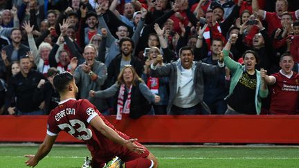 Emre Can libère les Reds (OLI SCARFF / AFP)