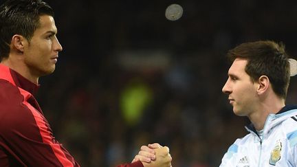 Cristiano Ronaldo et Lionel Messi (Portugal-Argentine) (PAUL ELLIS / AFP)