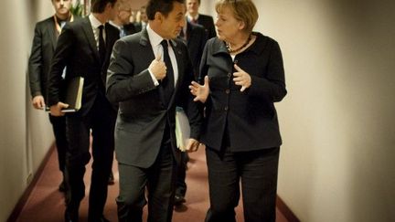 Nicolas Sarkozy et Angela Merkel sont parvenus à un accord. (Photo : samedi 22 octobre sommet de Bruxelles) (JESCO DENZEL / BUNDESREGEIRUNG / AFP)