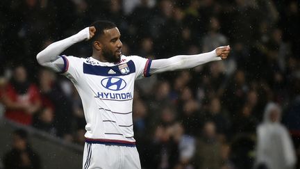 Alexandre Lacazette, l'attaquant de Lyon, buteur face à Reims. (JEFF PACHOUD / AFP)