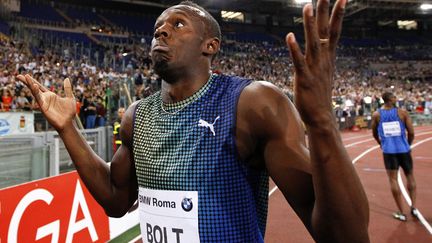 Le sprinter jama&iuml;cain Usain Bolt r&eacute;agit &agrave; sa deuxi&egrave;me place &agrave; l'issue de son 100 m&egrave;tres au meeting d'athl&eacute;tisme de Rome (Italie), le 6 juin 2013. (GIAMPIERO SPOSITO / REUTERS)