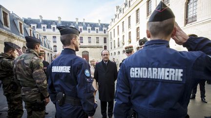 Le pr&eacute;sident de la R&eacute;publique, Fran&ccedil;ois Hollande, le 9 d&eacute;cembre 2014, &agrave; Paris. (IAN LANGSDON / AFP)