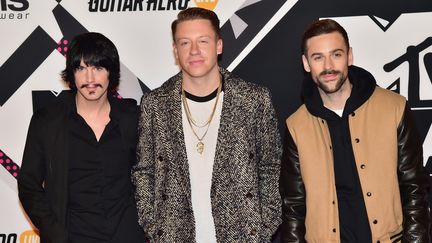 Eric Nally, US rapper Macklemore and Ryan Lewis aux 2015 MTV Europe Music Awards, à Milan, le 25 octobre 2015
 (GIUSEPPE CACACE / AFP)