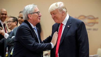 Jean-Claude Juncker et Donald Trump lors du sommet du G20 à Hambourg, le 8 juillet 2017 (MICHAEL KAPPELER / POOL)