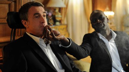 Fran&ccedil;ois Cluzet et Omar Sy dans une sc&egrave;ne du film "Intouchables" d'Olivier Nakache et Eric Toledano.&nbsp; (DDP IMAGES FILMFOTOS / SIPA)