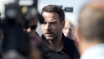 L'ancien trader de la Soci&eacute;t&eacute; g&eacute;n&eacute;rale J&eacute;r&ocirc;me Kerviel, lors de la F&ecirc;te de l'Humanit&eacute;, &agrave; La Courneuve (Seine-Saint-Denis), le 13 septembre 2014. (KENZO TRIBOUILLARD / AFP)