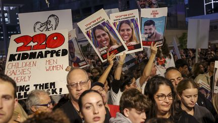 Relatives of Israeli hostages held in Gaza by Hamas take part in a demonstration demanding their release, in Tel Aviv, November 25, 2023, the second day of a truce between Israel and Hamas.  (GIL COHEN-MAGEN / AFP)