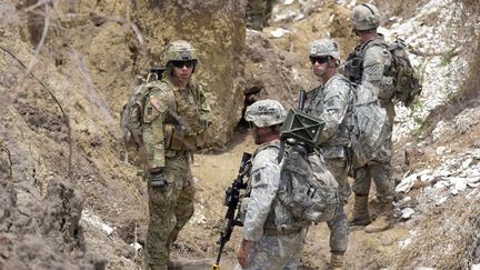 Militaires américains lors de manœuvres conjointes avec des soldats sénégalais à Thiès (70 km à l'est de Dakar), le 25 juillet 2017. (SEYLLOU / AFP)