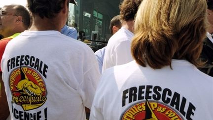 Grévistes de Freescale bloquant un dépôt de bus de Toulouse (23 septembre 2009) (© AFP / Pascal Pavani)