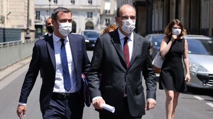 Jean Castex, le Premier ministre, et Olivier Véran, le ministre de la Santé, à Paris, le 16 juin 2021. (THOMAS COEX / AFP)