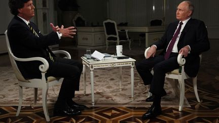 Russian President Vladimir Putin grants an interview to American host Tucker Carlson at the Kremlin, in Moscow, February 6, 2024. (GAVRIIL GRIGOROV / AFP)