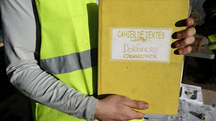 C'est sur ces cahiers de doléances que s'appuiera le grand débat promis par le gouvernement. (VALERY HACHE / AFP)