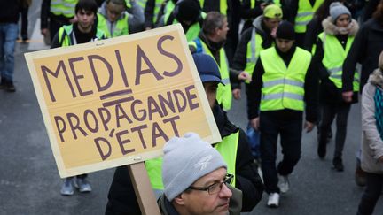 Des "gilets jaunes", lors d'une manifestation à Paris, le 12 janvier 2019. (LUDOVIC MARIN / AFP)