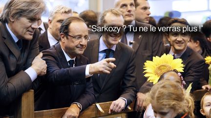 Paris perdu pour Fran&ccedil;ois Hollande. Pour sa premi&egrave;re visite de pr&eacute;sident de la R&eacute;publique au salon de l'Agriculture, le 23 f&eacute;vrier 2013, il promet &agrave; un enfant, qui lui parlait de Nicolas Sarkozy : "Tu ne le verras plus", provoquant l'hilarit&eacute; autour de lui. (KENZO TRIBOUILLARD / AFP)