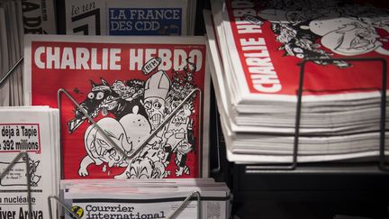 Charlie Hebdo dans les kiosques le 25 février.
 (MARTIN BUREAU / AFP)