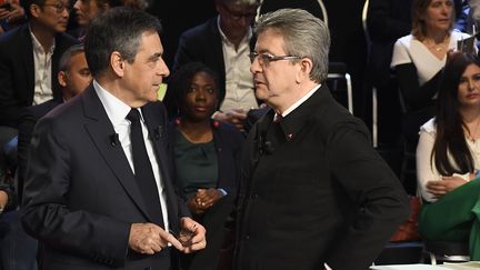 Jean-Luc Mélenchon et François Fillon lors du "Grand Débat", mardi 4 avril 2017. (LIONEL BONAVENTURE / POOL / AFP)