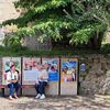 Des passantes assises devant des panneaux électoraux, à Saint-Junien (Haute-Vienne), le 9 juillet 2024. (RAPHAEL GODET / FRANCEINFO)