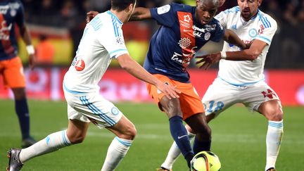 Dabo (Montpellier) pris dans la tenaille marseillaise (Isla et Manquilla) (PASCAL GUYOT / AFP)