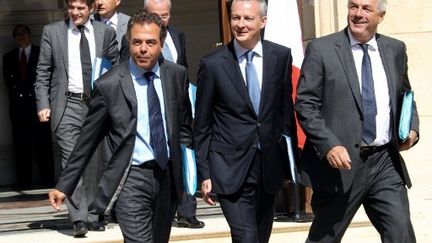 Brochette de ministres masculins, dont Luc Chatel, Bruno Le Maire et François Sauvadet (PIERRE VERDY / AFP)