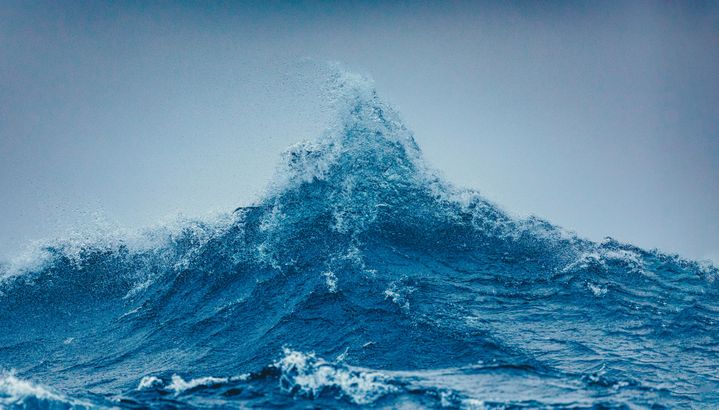 Two sea waves meet, creating a powerful peak-shaped wave in the ocean.  (Illustration) (DAVID MERRON PHOTOGRAPHY / MOMENT RF / GETTY IMAGES)