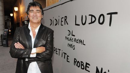 Les robes mises aux enchères proviennent de la collection personnelle de Didier Ludot, collectionneur fashion. Ici en septembre 2009, à l'inauguration de l'exposition "La petite robe noire".
 (LYDIE/SIPA)