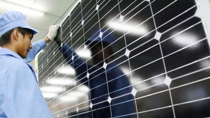 Equipés de nombreux panneaux solaires, Ordos se veut à la pointe de l’écologie et des nouvelles technologies environnementales.
	  (AFP / Imaginechina / Xu ruiping)