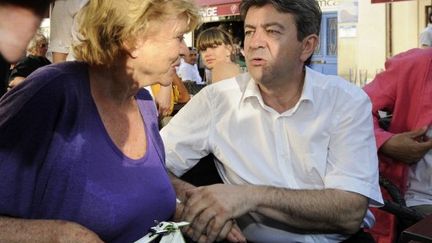 Eva Joly et Jean-Luc Mélenchon en 2011 (ANNE-CHRISTINE POUJOULAT / AFP)