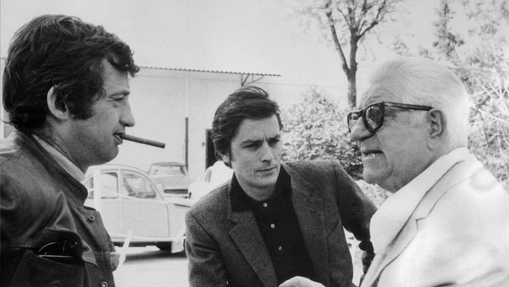 Les acteurs Jean-Paul Belmondo, Alain Delon et Jean Gabin, dans les années 1960 à Paris. (AFP)