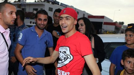 Weld El 15 accueilli par des amis au moment de sa libération à Tunis, le 2 juillet 2013
 (Mohamed Massara / Epa / Maxppp)