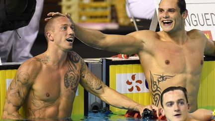 Les nageurs français Frédérick Bousquet et Florent Manaudou lors des championnats de France à Montpellier (PASCAL GUYOT / AFP)