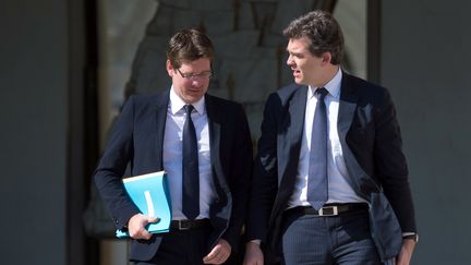 Le ministre du Redressement productif,&nbsp;Arnaud Montebourg (&agrave; droite), et le ministre du D&eacute;veloppement, Pascal Canfin, le 22 mai 2013 &agrave; l'Elys&eacute;e (Paris). (MARTIN BUREAU / AFP)